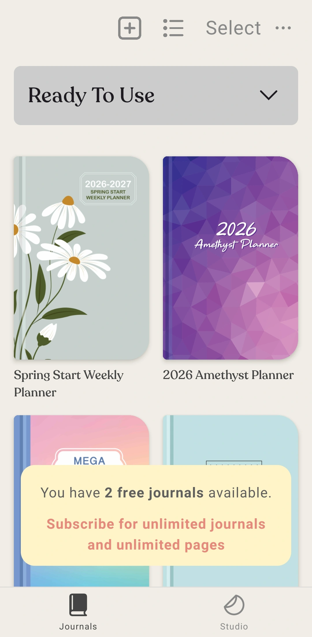 Zinnia on Android: a grid of ready-made journal covers, with a banner reading you have 2 free journals available, subscribe for unlimited journals and unlimited pages.